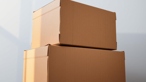 Two corrugated cardboard shipping boxes